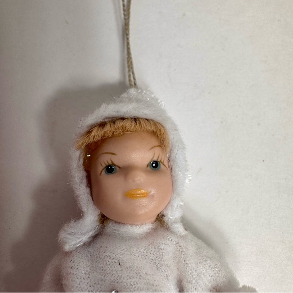 NWT. 7 porcelain doll ornaments. 5 of little girl and 2 of baby. - Picture 5 of 14